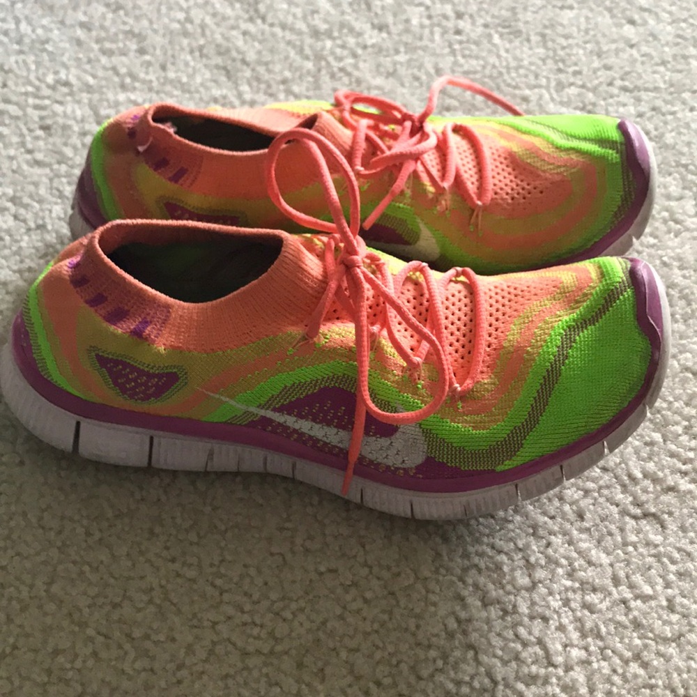 Nike flyknit rainbow tennis shoes.